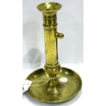 Brass Georgian candlestick with drip tray and side pusher, H: 20 cm. P&P Group 2 (£18+VAT for the