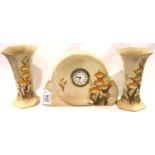 Ceramic clock by Cambridge pottery (not working) with two garniture vases. Not available for in-