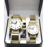 Ravel; his and hers two new old stock wristwatches, each on expanding bracelets and boxed, working