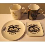 Two Poole ceramic mugs and two dolphin design Poole saucers. Not available for in-house P&P, contact