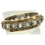 Unmarked 9ct gold tone set full eternity ring, size N, 3.8g. P&P Group 1 (£14+VAT for the first