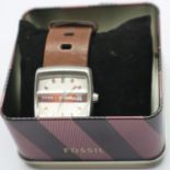 Fossil; retro square face wristwatch on brown leather strap, in original box. P&P Group 1 (£14+VAT