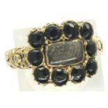 1819 Georgian 18ct gold and onyx mourning ring, size M/N, 3.7g. P&P Group 1 (£14+VAT for the first
