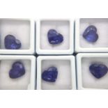 Six loose tanzanites with Gemological Institute Laboratory certificates. Largest 9.87cts. P&P