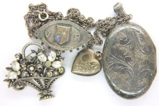Collection of hallmarked silver and white metal items including brooches and a locket. P&P Group