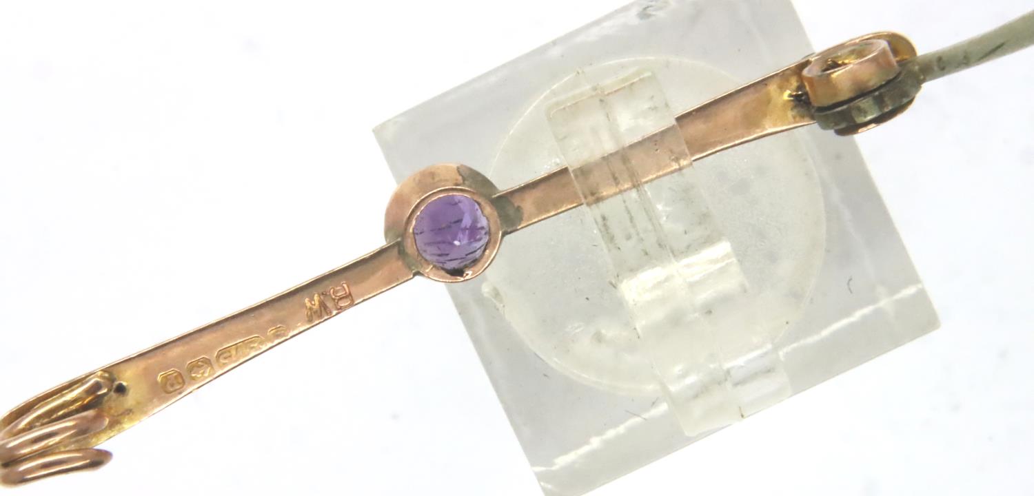 9ct gold amethyst set bar brooch, L: 40 mm, 1.8g. P&P Group 1 (£14+VAT for the first lot and £1+ - Image 2 of 2