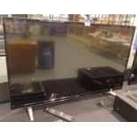 Hitachi 43HB6T72U 43'' flat screen television with remote (in office). Not available for in-house