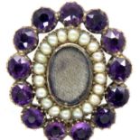 Victorian presumed 9ct gold foiled amethyst and seed pearl set mourning brooch, L: 25mm, 6.4g. P&P