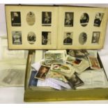 Album of Ogdens cigarette cards and a box of mixed cigarette cards. P&P Group 1 (£14+VAT for the