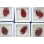 Six loose Rubies with Gemological Institute Laboratory certificates. Largest 10.47cts. P&P Group