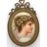 Continental miniature portrait on an oval porcelain panel, overall 72 x 48 mm. P&P Group 1 (£14+