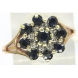 9ct gold sapphire and diamond cluster ring, size R/S, 2.9g. P&P Group 1 (£14+VAT for the first lot