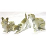 Three Lladro dogs, largest L: 13 cm, no cracks, chips or visible restoration, . P&P Group 2 (£18+VAT