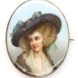 Rose gold mounted miniature hand painted brooch on an oval porcelain panel, overall 54 x 35 mm. P&