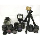 Chinon CE-4 camera with Vivitar zoom Thyristor 2500, tripod and various lenses. P&P Group 2 (£18+VAT