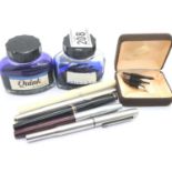Collection of mixed fountain pens including a 14ct gold nib example and two bottles of ink. P&P