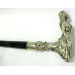 Ebonised walking stick with white metal handle featuring Leda and the swan. Not available for in-