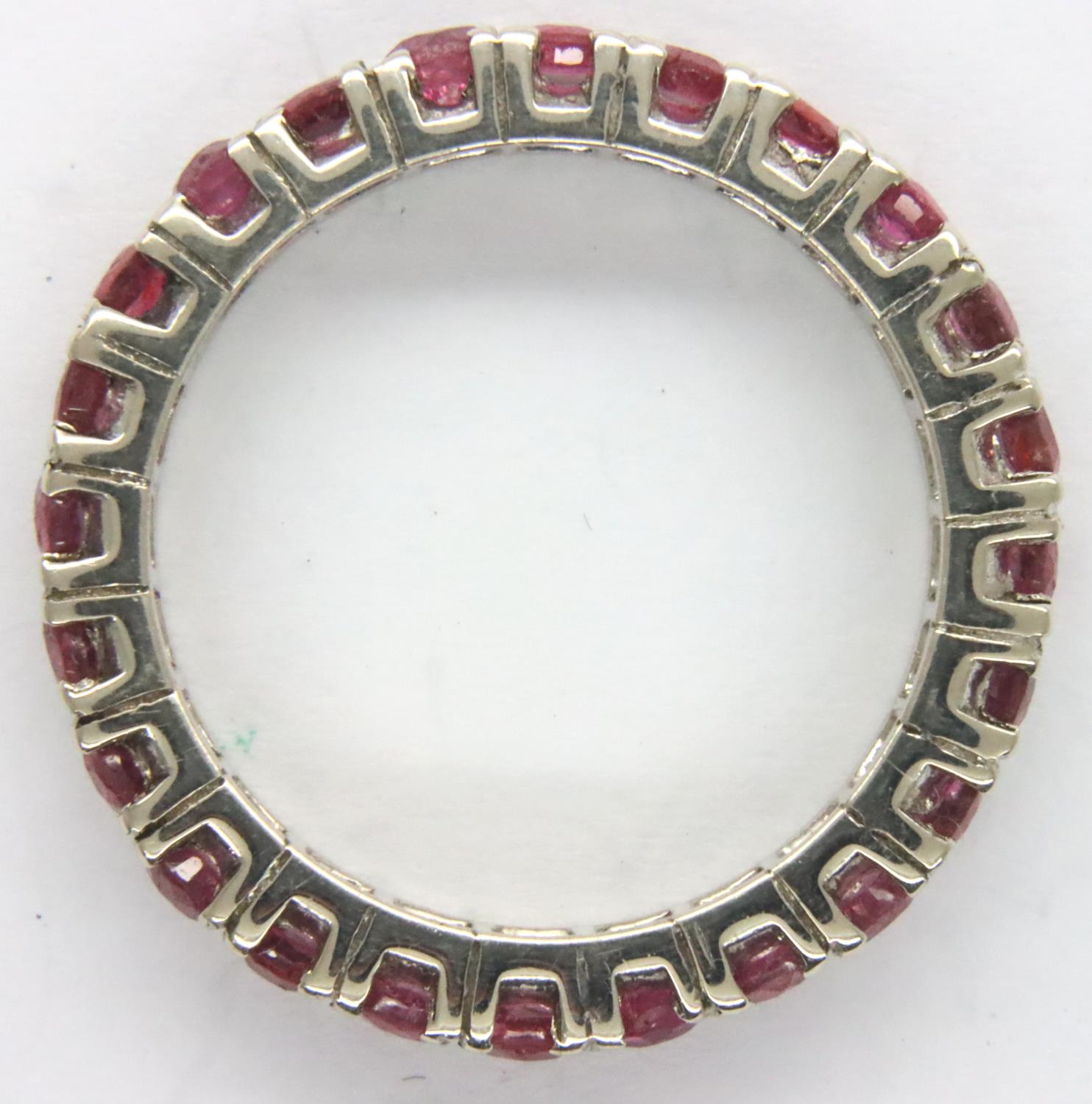 White metal and ruby full eternity ring, size O/P, 3g. P&P Group 1 (£14+VAT for the first lot and £ - Image 2 of 2