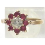 9ct gold topaz and ruby ring, size K/L, 1.8g. P&P Group 1 (£14+VAT for the first lot and £1+VAT