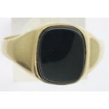 Gents 9ct gold onyx set ring, size Z+2, 3.2g. P&P Group 1 (£14+VAT for the first lot and £1+VAT