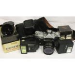 Zenit E camera with Pentacon and Helios lenses. P&P Group 2 (£18+VAT for the first lot and £3+VAT