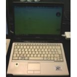 Toshiba Satellite laptop computer, running OS Windows 7 Professional, unlocked with charger.
