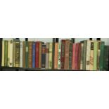 Two shelves of thirty two Folio Society books. Not available for in-house P&P, contact Paul O'Hea at