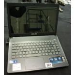 Asus X Altec Lansing laptop computer running OS Windows 7 Home Premium, username and password