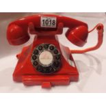Red, GPO Carrington, push button telephone in 1920s styling with pull-out pad tray; compatible