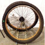 26 x 23 front and back mountain bike wheels with tyres and innertubes. Not available for in-house