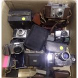 Box of mixed vintage cameras and accessories including a Kodak example. P&P Group 2 (£18+VAT for the