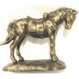 Bronzed cast iron saddled horse, L: 22 cm. P&P Group 2 (£18+VAT for the first lot and £3+VAT for
