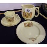 Four pieces of early Royal Commemorative ware to include a single handled water jug. Not available