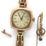 9ct gold ladies wristwatch, movement back and glass damaged, having an unusual 9ct gold expanding