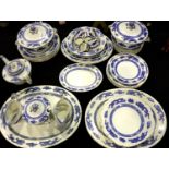 Cauldon tea and dinner service in the Dragons pattern, fifty pieces total, some crazing throughout