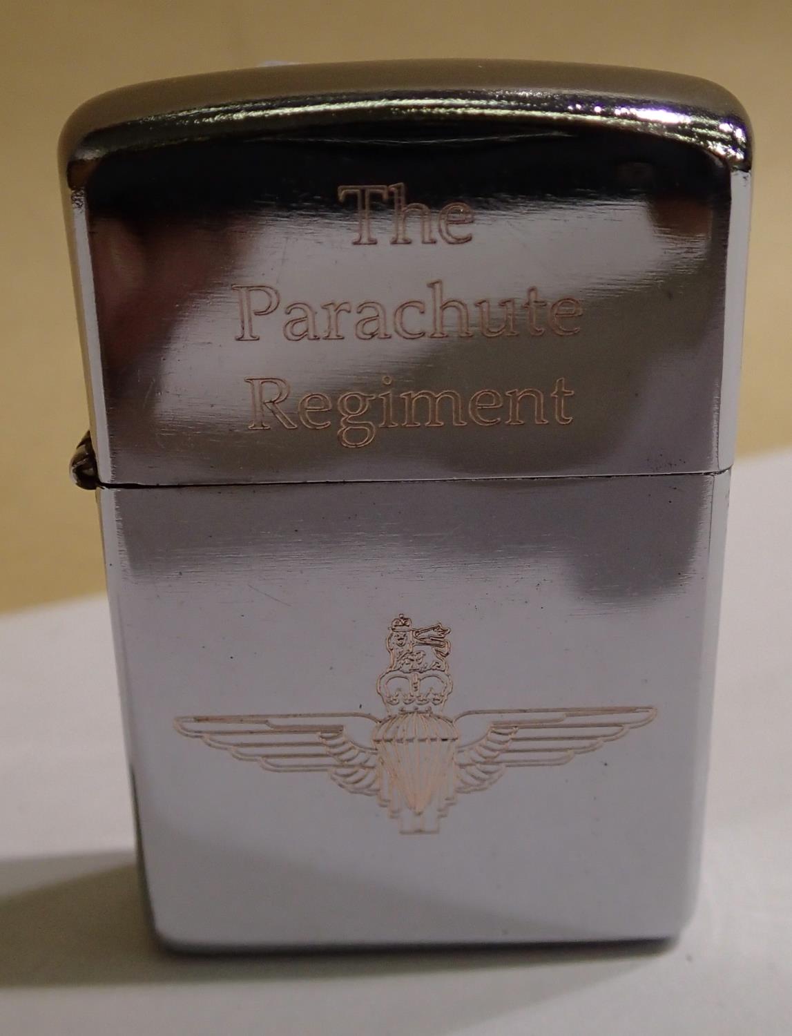 The Parachute Regiment engraved windproof lighter. P&P Group 1 (£14+VAT for the first lot and £1+VAT