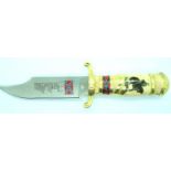 Modern South American hunting knife with brass grip and enamelled decoration. P&P Group 2 (£18+VAT