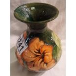 Moorcroft Coral ground Claremont vase with poor repair, H: 14 cm. P&P Group 2 (£18+VAT for the first