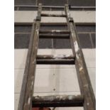 Two extending wooden step ladders approx 15 feet fully extended. Not available for in-house P&P,