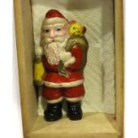 1920s celluloid Father Christmas, H: 12 cm. P&P Group 1 (£14+VAT for the first lot and £1+VAT for