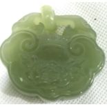 Chinese carved celadon green jade fidelity lock, decorated with flowers, W: 5cm, H: 45 mm. P&P Group