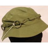 Vietnam War period jungle hat with grenade rings. P&P Group 2 (£18+VAT for the first lot and £3+