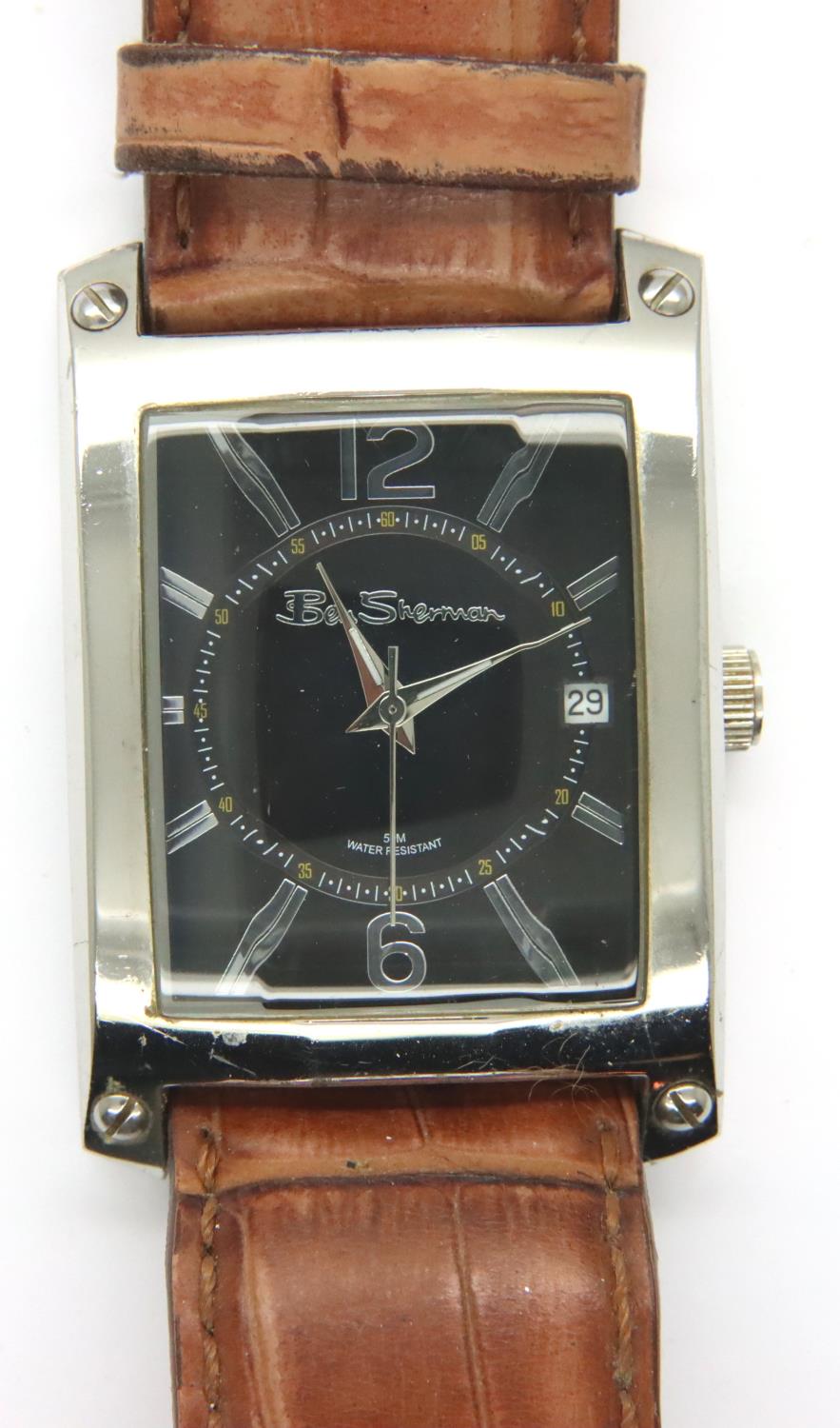 Ben Sherman; gents wristwatch on brown leather strap with black and silver face. Working at lotting.