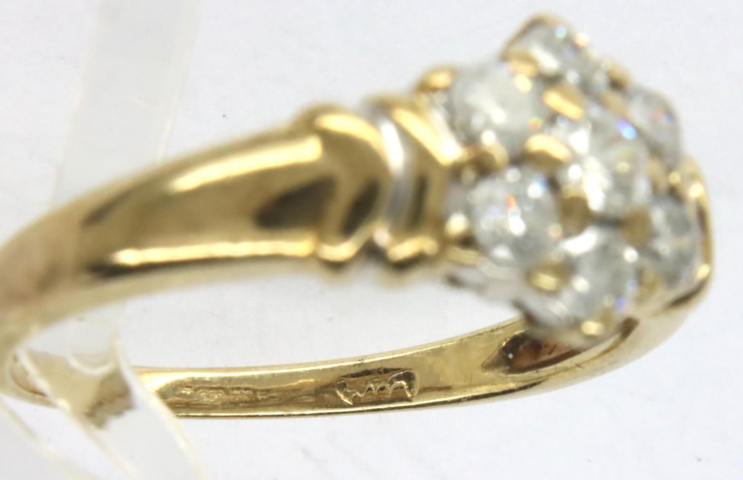 9ct gold and 0.5cts diamond daisy ring, size M/N, 2.7g. P&P Group 1 (£14+VAT for the first lot - Image 4 of 4