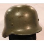 WWII German Luftwaffe single decal M40 helmet, stamped NS62 to denote it is a size 62mm shell (