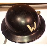 British Home Front ARP badge helmet, painted black with white W, dated 1941. P&P Group 3 (£25+VAT