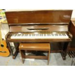 Boyd of London overstrung upright piano in polished mahogany with stool. Not available for in-