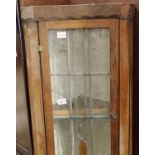 An oak single leaded glazed corner cupboard, W: 51 cm, H: 99 cm. Not available for in-house P&P,