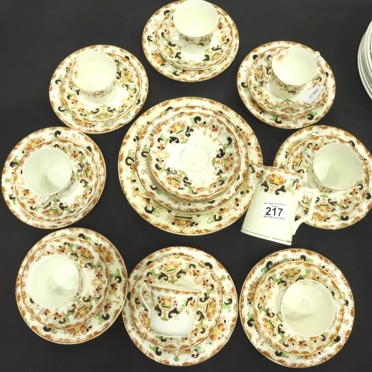 Edwardian tea service of thirty pieces with gilt and floral decoration, signs of use and wear