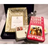 Two Spice Girls metal pencil cases, a flask in the shape of a mobile phone and a rectangular dish.